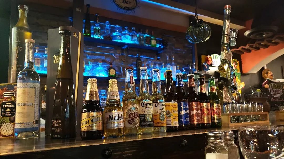 Al pastor tacos served on corn tortillas at Tacos Mexico Memorial Calgary