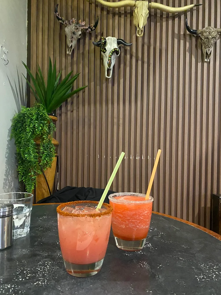 Nachos Del Rey with guacamole and salsa at Tacos Mexico Memorial Calgary